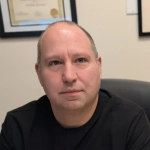 Headshot of Dr. Jordan Kovacs, chiropractic physician